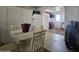 Kitchen with dining area and view into adjacent room at 8700 E University Dr # 1322, Mesa, AZ 85207