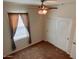 Cozy bedroom with double-door closet and window at 148 S 225Th Ln, Buckeye, AZ 85326