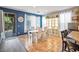 Casual dining area with white table and chairs, adjacent to kitchen at 35202 N 30Th Dr, Phoenix, AZ 85086
