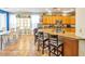Open kitchen with breakfast bar and seating area at 35202 N 30Th Dr, Phoenix, AZ 85086