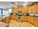 Kitchen boasts stainless steel appliances and ample counter space at 35202 N 30Th Dr, Phoenix, AZ 85086
