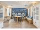 Bright dining area with a table and chairs, featuring stylish decor and string lights at 35202 N 30Th Dr, Phoenix, AZ 85086