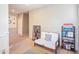 Upstairs hallway with seating area and built-in shelving at 35202 N 30Th Dr, Phoenix, AZ 85086