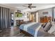Spacious primary bedroom with wood floors and large sliding door at 35202 N 30Th Dr, Phoenix, AZ 85086