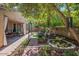 Private backyard with patio, pergola, and beautiful landscaping at 35202 N 30Th Dr, Phoenix, AZ 85086