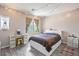 Bright bedroom with a white bed frame and string lights at 35202 N 30Th Dr, Phoenix, AZ 85086