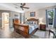Large main bedroom with king-size sleigh bed and walk-in closet at 35202 N 30Th Dr, Phoenix, AZ 85086