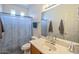 Clean bathroom with shower/tub combo and updated vanity at 35202 N 30Th Dr, Phoenix, AZ 85086