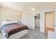 Bedroom with a white bed frame and large closet at 35202 N 30Th Dr, Phoenix, AZ 85086