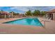 Inviting community pool with lounge chairs at 3491 N Arizona Ave # 138, Chandler, AZ 85225