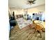 Spacious living room with stone fireplace and wood-look flooring at 205 N Cameron Ave, Casa Grande, AZ 85122