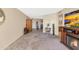 Living room features fireplace and view to another room at 17404 N 99Th Ave # 108, Sun City, AZ 85373