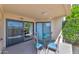 Private patio with seating and lovely view at 17404 N 99Th Ave # 108, Sun City, AZ 85373