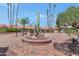 Landscaped courtyard with brick pathways and a striking saguaro cactus at 17404 N 99Th Ave # 108, Sun City, AZ 85373