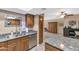 Kitchen boasts stainless steel dishwasher and double sink at 17404 N 99Th Ave # 108, Sun City, AZ 85373