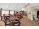 Community clubhouse featuring a library, seating areas, and kitchen at 17404 N 99Th Ave # 108, Sun City, AZ 85373
