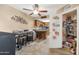 Eat-in kitchen with pantry and stainless steel appliances at 17404 N 99Th Ave # 108, Sun City, AZ 85373