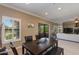 Dining area with a view of the living room and sliding door access to balcony at 21320 N 56Th St # 2163, Phoenix, AZ 85054