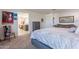 Main bedroom with ensuite bathroom and stylish decor at 29405 N 123Rd Gln, Peoria, AZ 85383