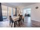 Dining area with table and chairs near sliding doors at 29405 N 123Rd Gln, Peoria, AZ 85383