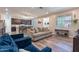 Open living room with a view of the kitchen at 29405 N 123Rd Gln, Peoria, AZ 85383
