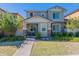 Two-story home with stone and siding accents, landscaped yard at 29405 N 123Rd Gln, Peoria, AZ 85383