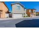 Two-story house with white garage door at 29405 N 123Rd Gln, Peoria, AZ 85383