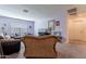 Spacious living room featuring comfortable seating and large windows at 29405 N 123Rd Gln, Peoria, AZ 85383
