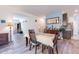 Open dining area with view into living room at 29405 N 123Rd Gln, Peoria, AZ 85383
