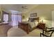 Main bedroom with wood furniture and backyard access at 8894 E Sheena Dr, Scottsdale, AZ 85260