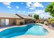 Inviting kidney-shaped pool perfect for relaxation at 8894 E Sheena Dr, Scottsdale, AZ 85260