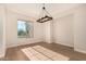 Bright dining room with hardwood floors and a chandelier at 6032 E Thunder Hawk Rd, Cave Creek, AZ 85331