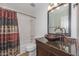 Bathroom with granite vanity and vessel sink at 6221 W Sunnyside Dr, Glendale, AZ 85304