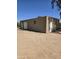Tan metal workshop building with two doors at 26415 S Recker Rd, Queen Creek, AZ 85142