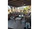 Covered patio with wicker furniture and ceiling fan at 26415 S Recker Rd, Queen Creek, AZ 85142