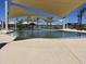 Resort-style pool with water features and shade structures at 16006 W Electra Lane Ln, Surprise, AZ 85387