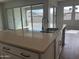Modern kitchen island with double sink and spacious countertop at 15935 W Montana De Oro Dr, Surprise, AZ 85387