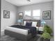 Spacious bedroom with plush bedding and contemporary decor at 15935 W Montana De Oro Dr, Surprise, AZ 85387