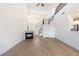 Open living room with a fireplace and high ceilings at 12641 N 18Th Pl, Phoenix, AZ 85022