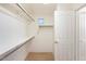 Large walk-in closet with ample shelving at 12641 N 18Th Pl, Phoenix, AZ 85022