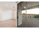 Glass door leads to a spacious patio with mountain views at 12641 N 18Th Pl, Phoenix, AZ 85022
