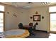 Community game room with table and chairs at 8500 E Southern Ave # 586, Mesa, AZ 85209