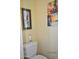 Small toilet area with artwork and air freshener at 8500 E Southern Ave # 586, Mesa, AZ 85209