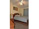 Main bedroom with ceiling fan and large bed at 8500 E Southern Ave # 586, Mesa, AZ 85209