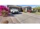 House exterior view with driveway and landscaping at 16449 W Shangri La Rd, Surprise, AZ 85388