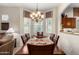 Formal dining room with chandelier and seating for six at 6202 E Mckellips Rd # 65, Mesa, AZ 85215