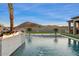 Luxury pool with fire feature and mountain views at 23625 N 63Rd Dr, Glendale, AZ 85310