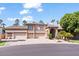Two story home with three car garage and lush landscaping at 580 N Benson Ln, Chandler, AZ 85224