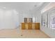 Modern wet bar with wood cabinets and built in shelving at 580 N Benson Ln, Chandler, AZ 85224