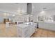 Spacious kitchen with white cabinets and an island at 580 N Benson Ln, Chandler, AZ 85224